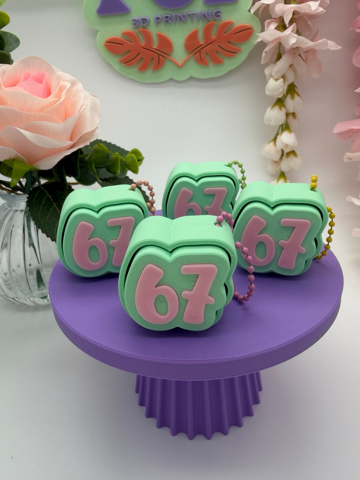 "67" Clicker Keychain