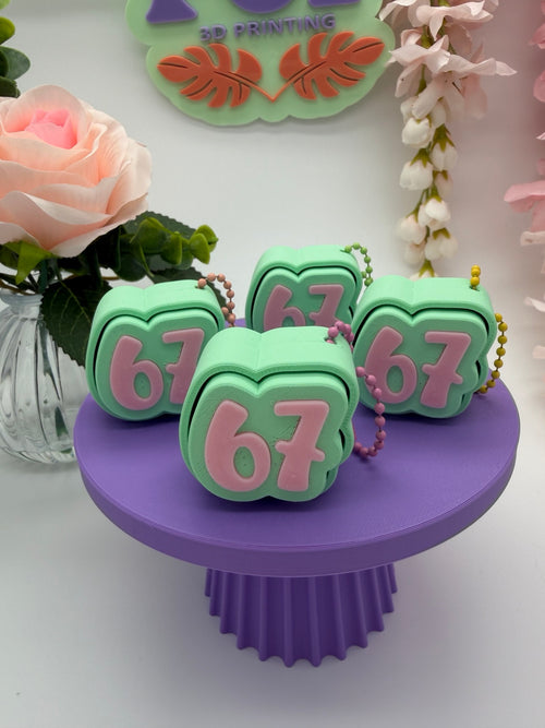 "67" Clicker Keychain
