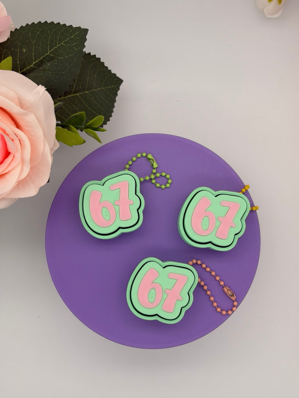"67" Clicker Keychain